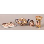 A ROYAL CROWN DERBY MINIATURE TEAPOT, 5cm, and a rectangular pin tray, 8cm x 6cm, an hexagonal