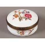 A MID 18TH CENTURY ENGLISH ENAMEL BOX, circular, painted with summer flowers and dragonflies and a