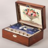 A VICTORIAN ROSEWOOD WORK BOX inlaid in mother-of-pearl with an oval cartouche and escutcheon,