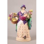 CHARLES VYSE (1882-1971), 'The Tulip Woman', a Chelsea Pottery figure 1921, hand painted,