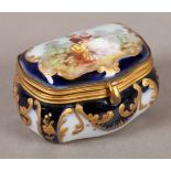 A LATE 19TH CENTURY PARIS PORCELAIN BOX, the cover painted with a lady in a landscape against a dark