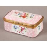 AN 18TH CENTURY GERMAN PALE PINK ENAMEL BOX, rectangular, the cover and painted with sprays of