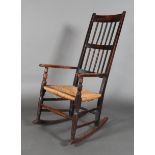 A MID 19TH CENTURY ELM AND FRUITWOOD HIGH BACK ELBOW CHAIR, two galleries of bobbin turned spindles,