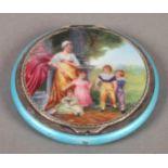 A FRENCH ENAMEL AND .925 SILVER COMPACT, circular, the cover with a family group of mother and her