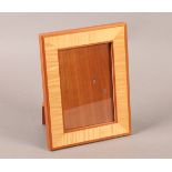 A LINLEY SYCAMORE AND WALNUT BANDED PHOTOGRAPH FRAME, rectangular, 20.5cm x 16cm, stamped Linley