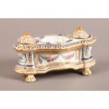 A 19TH CENTURY FRENCH 'SEVRES' INKSTAND, oblong, having a central dish polychrome enamelled with