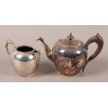 A DUTCH SILVER BACHELORS TWO PIECE TEA SERVICE comprising tea pot and cream jug, each piece of