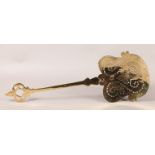 A GEORGE III BRASS CREAM SKIMMER, incised leaf scrolls, the pierced handle with acorn finial, 57.5cm