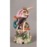 A MID 18TH CENTURY CHELSEA DERBY PORCELAIN FIGURE OF NEPTUNE AND DOLPHIN upon a high rocky base