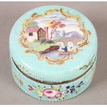 AN 18TH CENTURY SOUTH STAFFORDSHIRE ENAMEL BOX, circular, the cover painted with a riverside