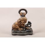 A VICTORIAN CAST IRON DOOR PORTER modelled as a lion and serpent, serpentine front plinth base and