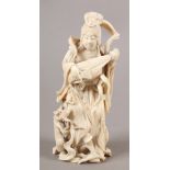 A JAPANESE IVORY OKIMONO, tusk carving, a bijin playing a musical instrument whilst entwined by a