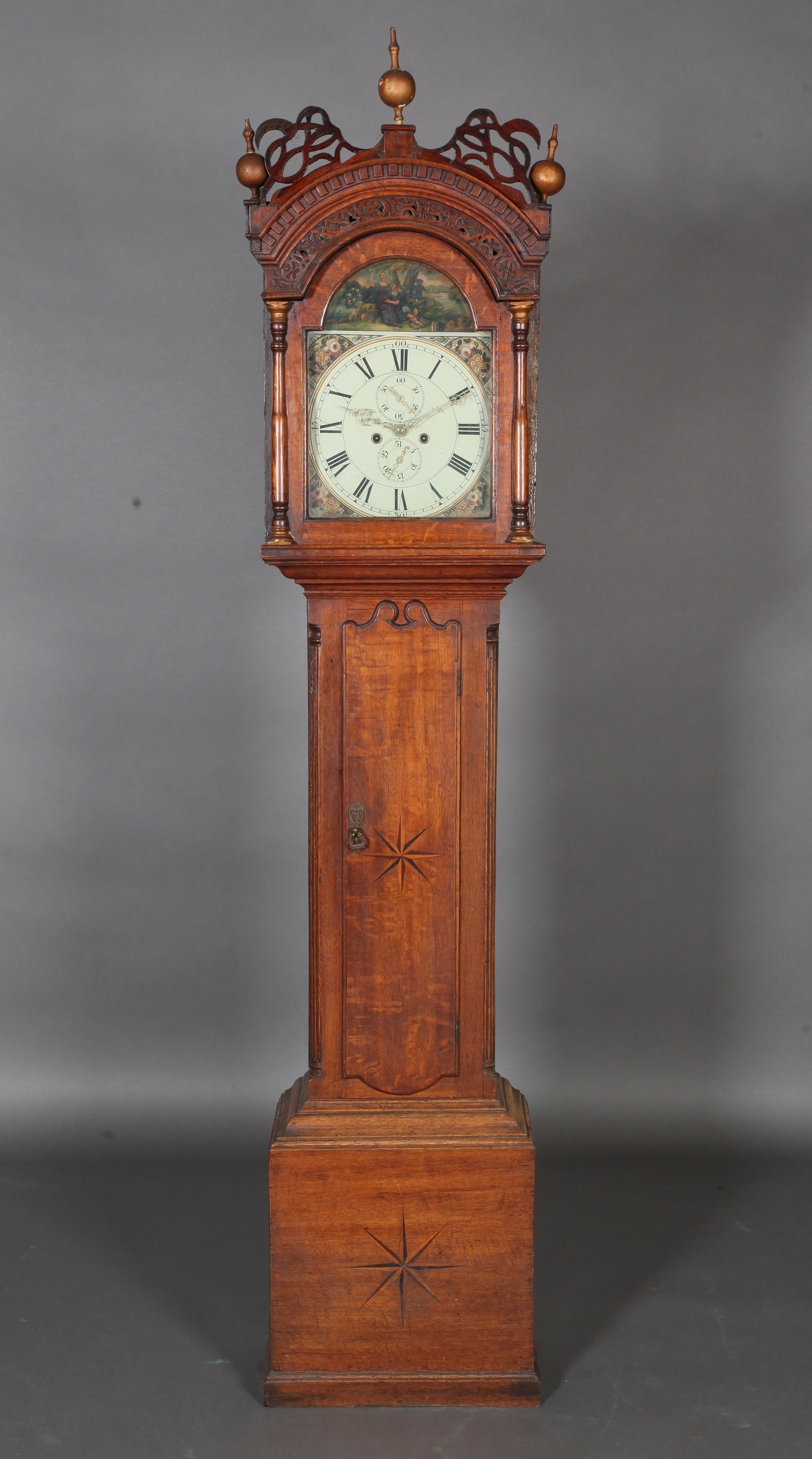 A GEORGE III OAK LONGCASE CLOCK, ornate hood fret cut, dentil moulded and with three gold painted