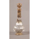 A VICTORIAN GOLD MOUNTED CUT GLASS SCENT BOTTLE of elongated pear shape with oval slice cut body,