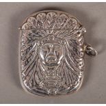 AN AMERICAN STERLING SILVER VESTA CASE, embossed with the head of a native American chief to both