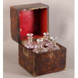 A MID 19TH CENTURY FRENCH BURR ELM VENEERED FOUR BOTTLE DECANTER BOX with brass carrying handles,