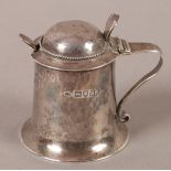 A GEORGE V SILVER PLANISHED MUSTARD POT AND DOMED COVER with twisted wirework band and trefoil