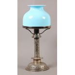 A VICTORIAN SILVER PLATED CANDLE LAMP by Hukin & Heath, having spring loaded sconce with sleeve ,