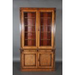 A VICTORIAN OAK BOOKCASE, moulded cornice with shallow frieze carved with leafy palmettes and