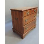 A reproduction oak small chest of drawers by Hammary, Lenoir, Northern Carolina, the rectangular top