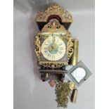 A reproduction Dutch alarm wall clock in late 17th century style, the shaped back plate with