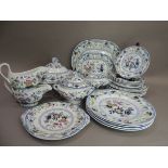 A quantity of Minton dinnerware comprising dinner plates, medium and small plates, oval dishes, a