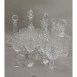 Three Edinburgh cut glass decanters and stoppers, square form, 27cm high approximately; together
