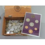 Wooden box of English and foreign currency plus UK 1980 proof sets