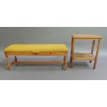 An oak and pine framed long stool with stuffed over upholstered top the shallow frieze applied split
