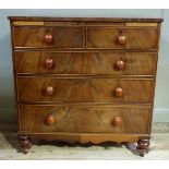 A Victorian mahogany chest of drawers, fitted two short and three long graduated, cockbeaded drawers