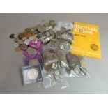 A tin of miscellaneous English and foreign coins including pre-decimal bronze, crowns (inc 1935),