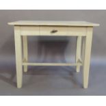 A painted single drawer side table the rectangular top above a frieze fitted short drawer on