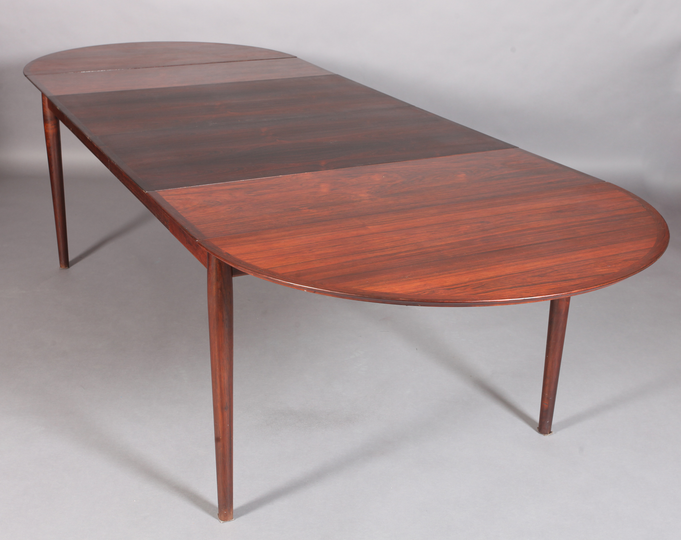 ARNE VODDER FOR SIBAST, Denmark, c.1960s, a Model 227 rosewood veneered extending dining table,