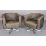 A PAIR OF MILO BAUGHMAN STYLE SWIVEL TUB CHAIRS upholstered in two tone bronze/black fabric, on
