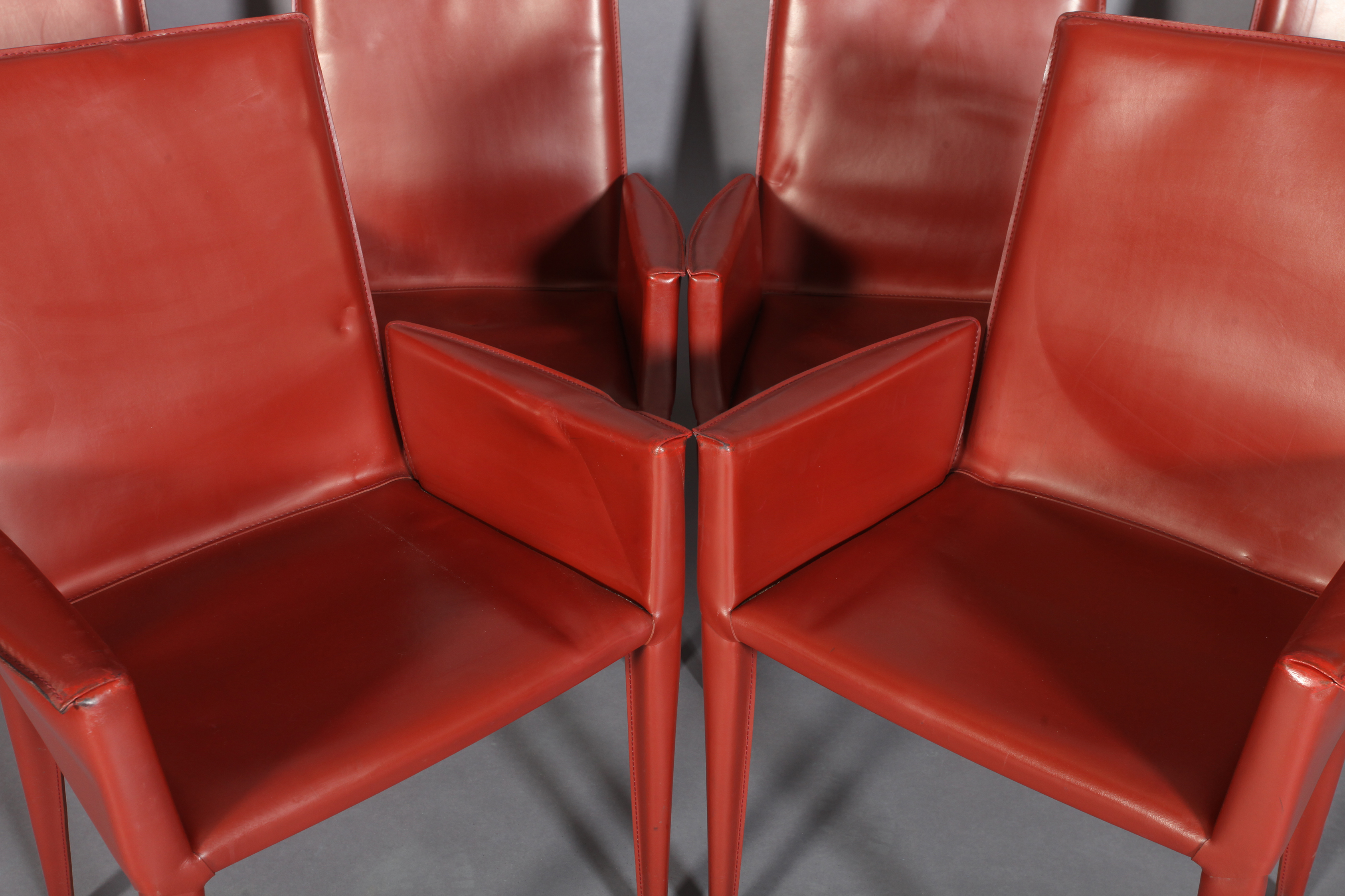 FRAG, ITALY, a set of six fox red leather high back dining chairs, on tapered legs - Image 4 of 4