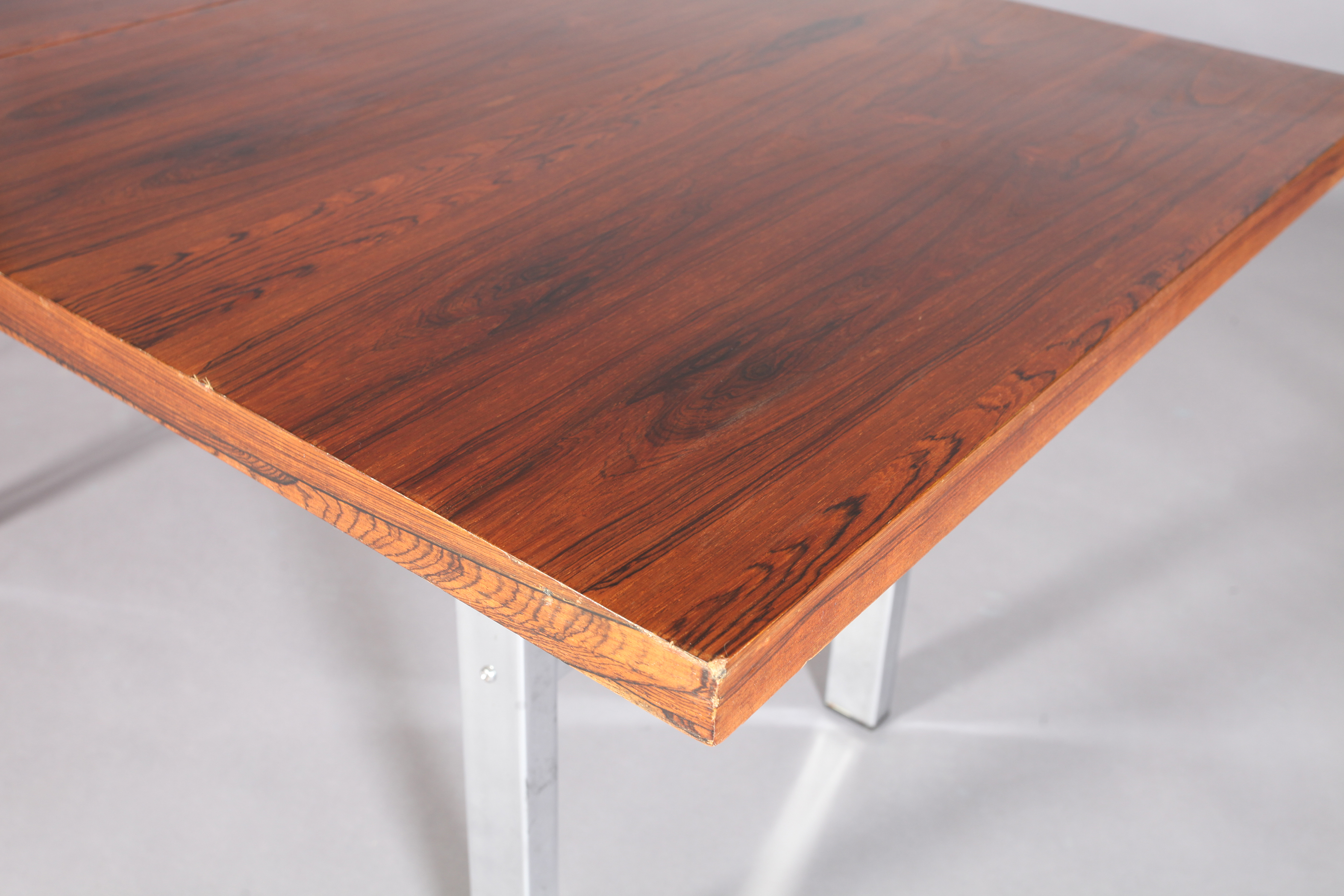 MERROW ASSOCIATES, BRITAIN, c.1970s, a rosewood extending dining table, rectangular, on refectory - Image 4 of 6