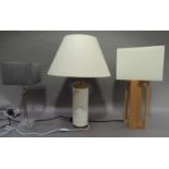 Three modern table lamps including beech open cruciform, marble effect cylindrical, chrome and