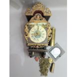 A reproduction Dutch alarm wall clock in late 17th century style, the shaped back plate with