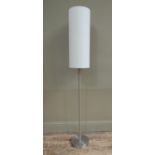 A brushed steel standard lamp with tall cylindrical white shade, 150cm high
