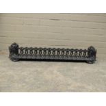 A Victorian black and cast iron fire kerb of interlaced foliate form, 100cm wide