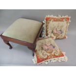 A mahogany stool on cabriole legs on pad feet together with two tasseled floral gros point
