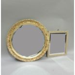 A gold painted circular wall mirror with bevelled plate, 49cm diameter; a silver painted rectangular