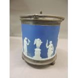 A Wedgwood blue jasper dip cylindrical biscuit barrel decorated in white relief with classical