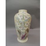 An Edwardian milk glass vase hand painted with sprays of flowers, 33cm high
