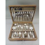 A quantity of Mappin and Webb silver plated table cutlery in oak canteen