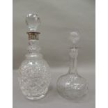 A silver mounted cut glass decanter with facetted globular stopper, silver neck, triple collar and