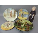 A Goebel decanter in the form of a monk together with three Doulton series ware plates, Orlando,