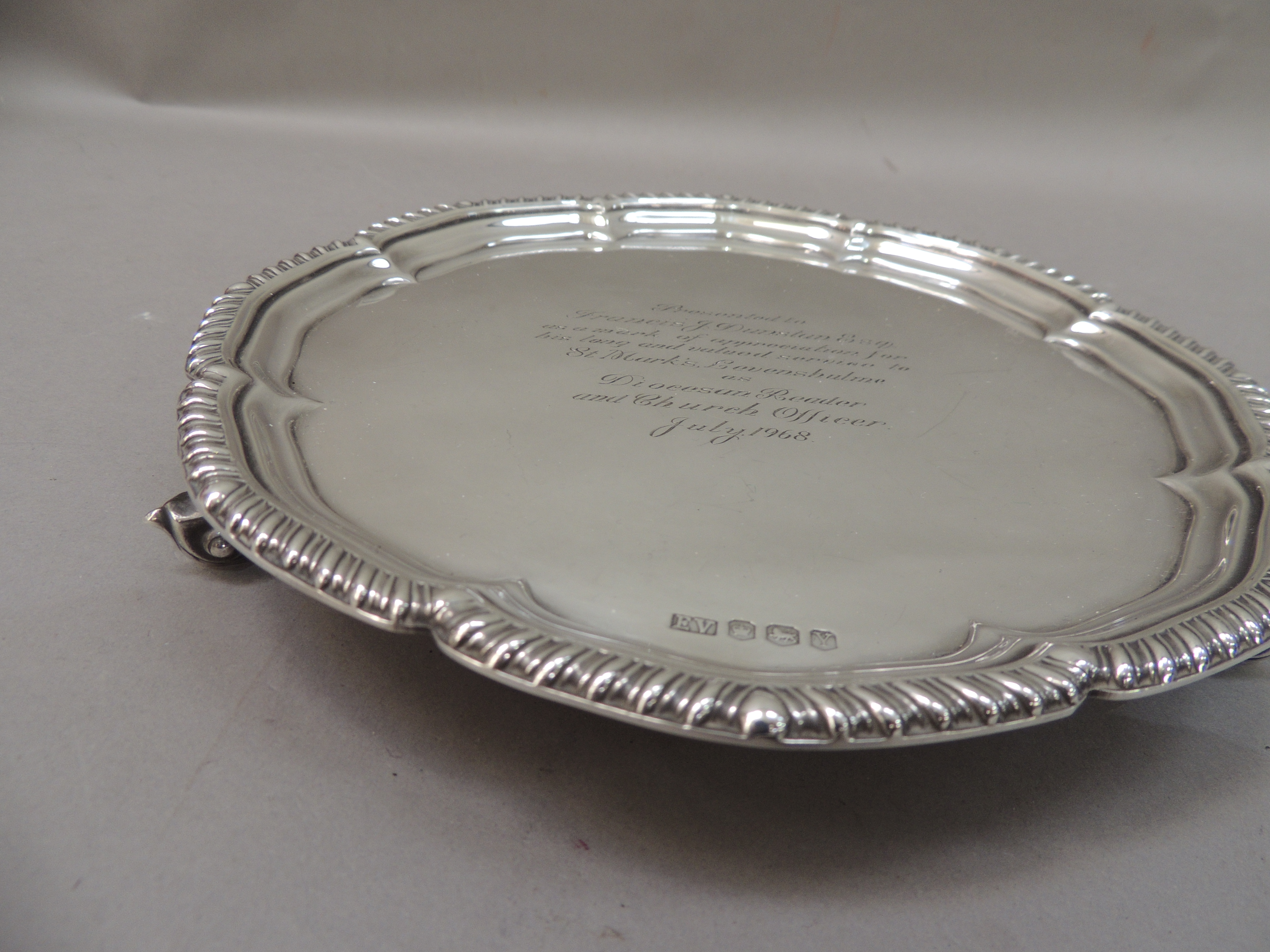 A George III style silver salver with gadrooned rim, the centre bearing presentation inscription, - Image 2 of 2
