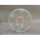 An English opalescent glass bowl, moulded in relief with stylised shells, 20cm diameter,