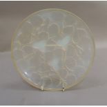 An Arxere opalescent glass circular bowl, the reverse moulded in relief with leaves and hazelnuts,